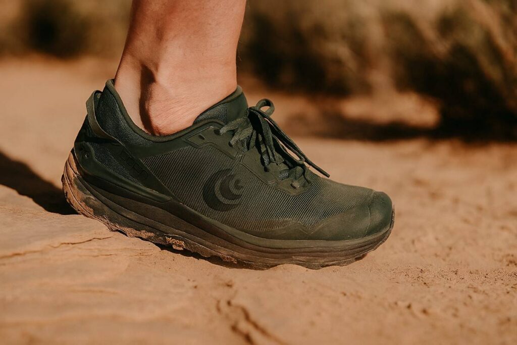 Close‑up of Topo Athletic Traverse shoe on dusty Bryce Canyon desert trail.