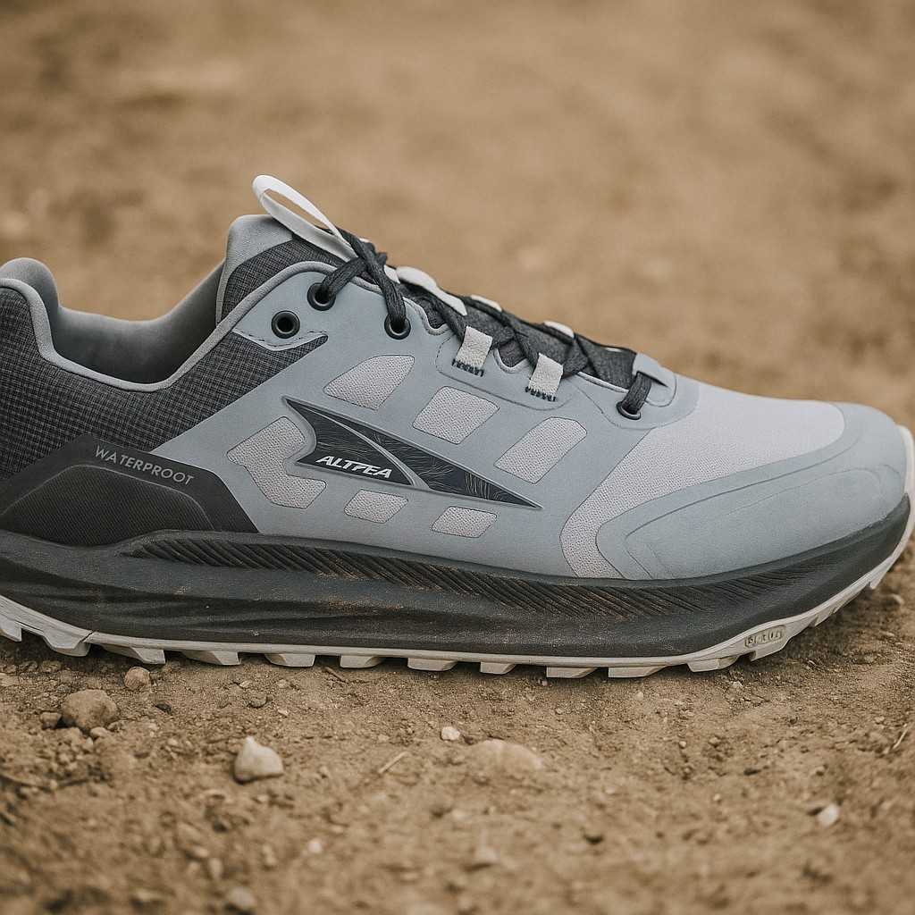 Altra Lone Peak 9 Waterproof trail running shoes on a dusty dirt path.