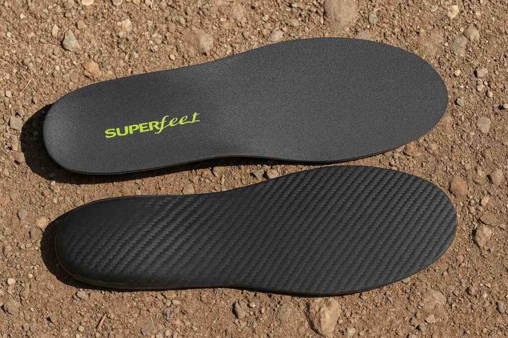 Superfeet Carbon lightweight thin insole with carbon fiber support for low-volume footwear.