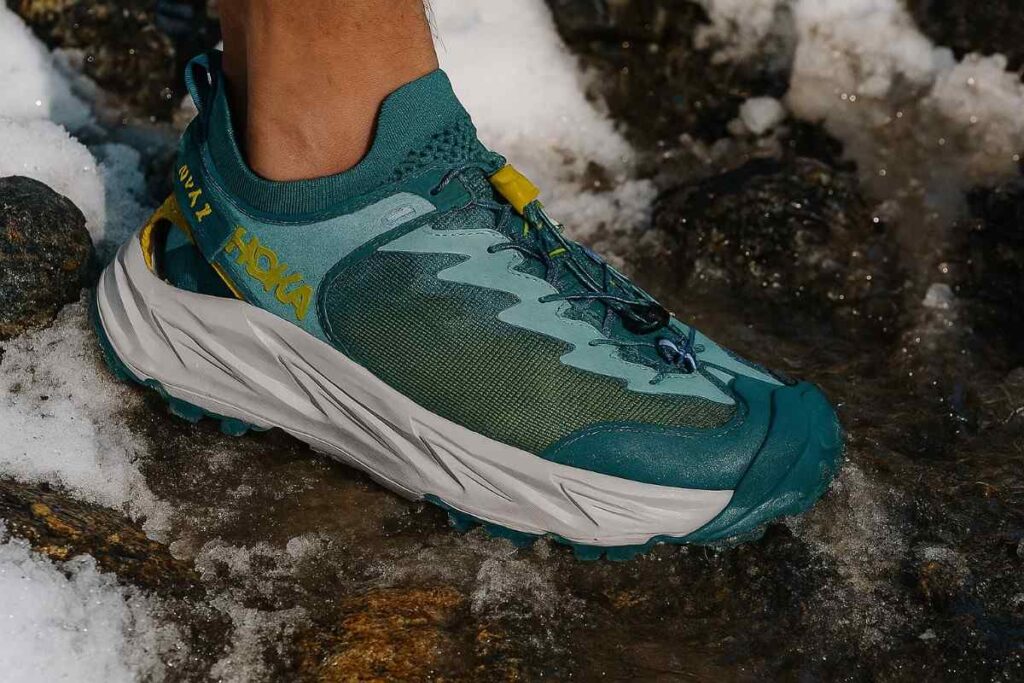 Close up of a hiker wearing Hoka Hopara 2.