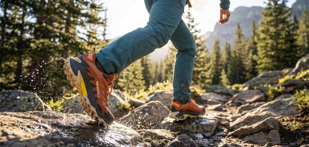 Hiker walking on rocks wearing Merrell Moab Speed 2 GTX.