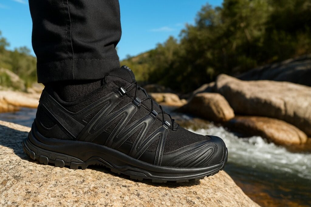 Close-up of hiker wearing Salomon XA Pro 3D with water stream in background.