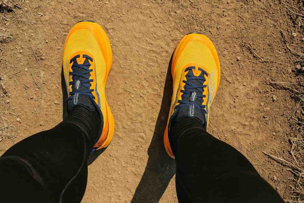 Selfie shot of hiker's legs wearing saucony peregrine 15. 