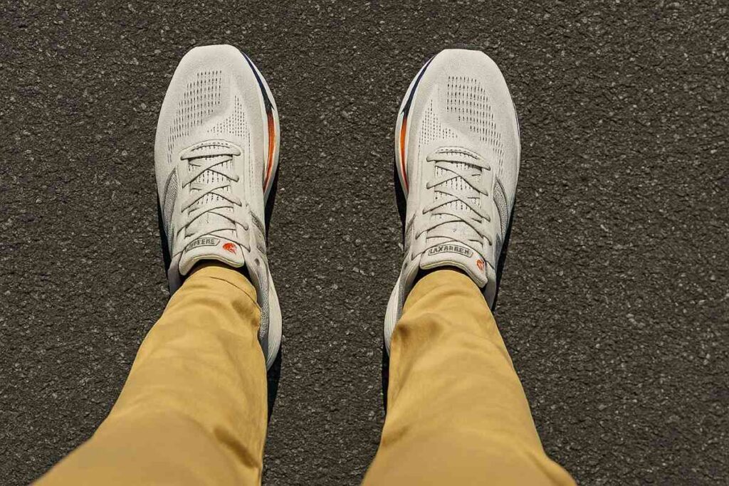 Above angle view of New Balance Fresh Foam X 1080 v14 on road trail.