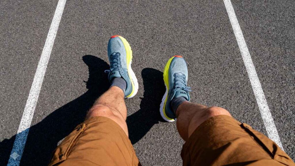 Selfie shot of hiker's legs wearing HOKA Bondi 8.