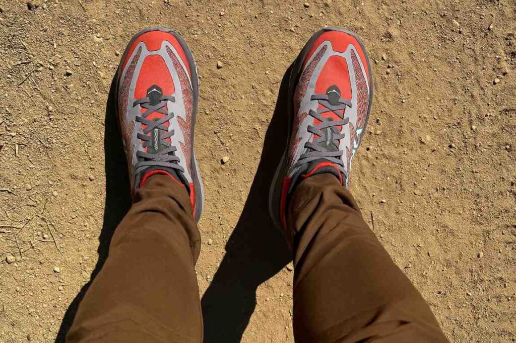 Selfie shoe of hiker's legs wearing HOKA Mafate Speed 4.