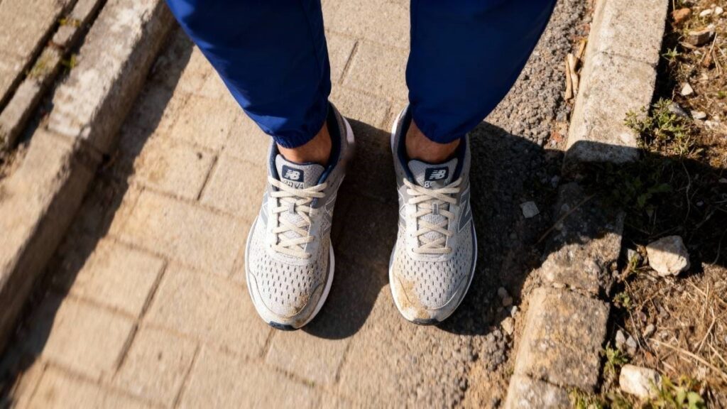 Above angle view of New Balance 847v4 in hiker's legs. 