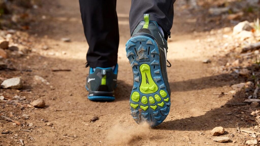 Hiker walking wearing Altra Lone Peak 5.