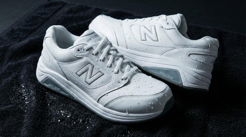 Pair of New Balance 928v3 placed on a black towel.